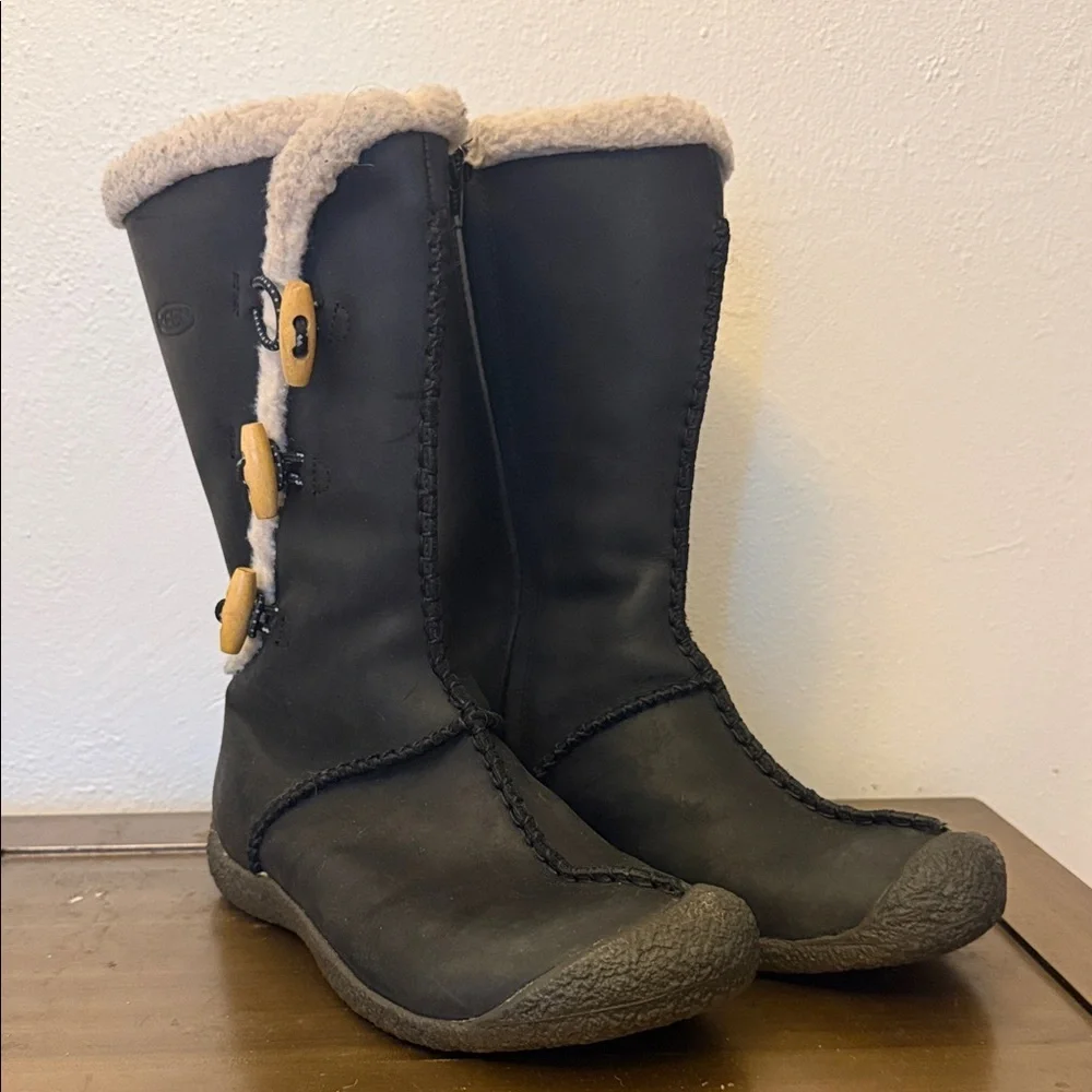 Black Shearling-Trim Winter Boots with Toggle Accents